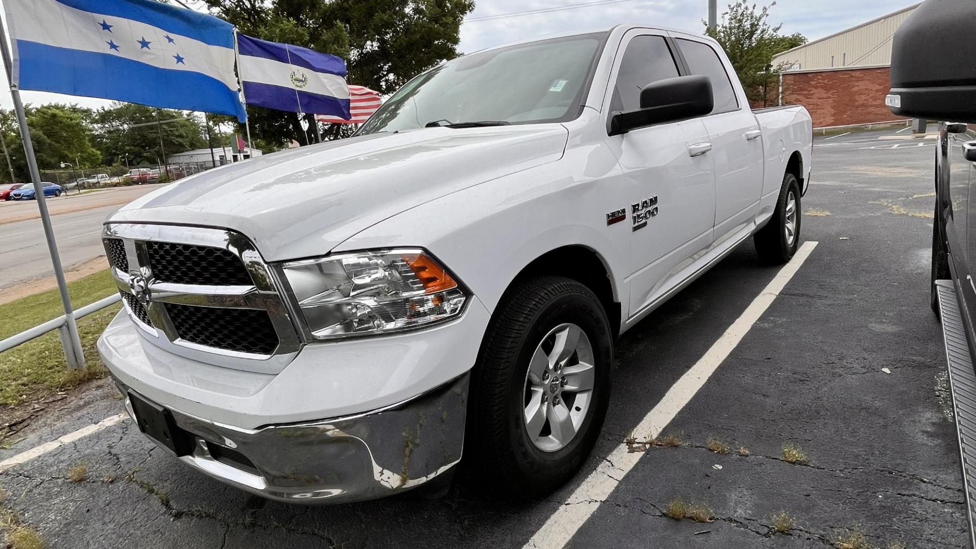 2019 white RAM 1500 SLT Crew Cab LWB 2WD (1C6RR6TT2KS) with an 5.7L V8 OHV 16V engine, 8A transmission, located at 945 E. Jefferson Blvd, Dallas, TX, 75203, (214) 943-7777, 32.752514, -96.811630 - Photo#0